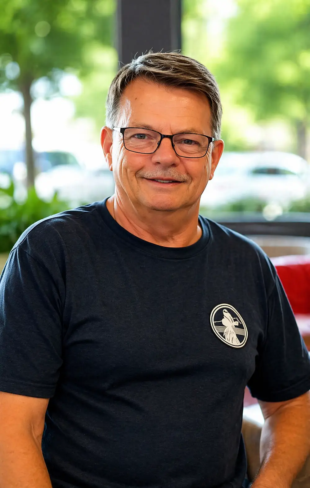 Male customer smiling after getting life insurance policy online in 15 minutes with TrustedLifeRates