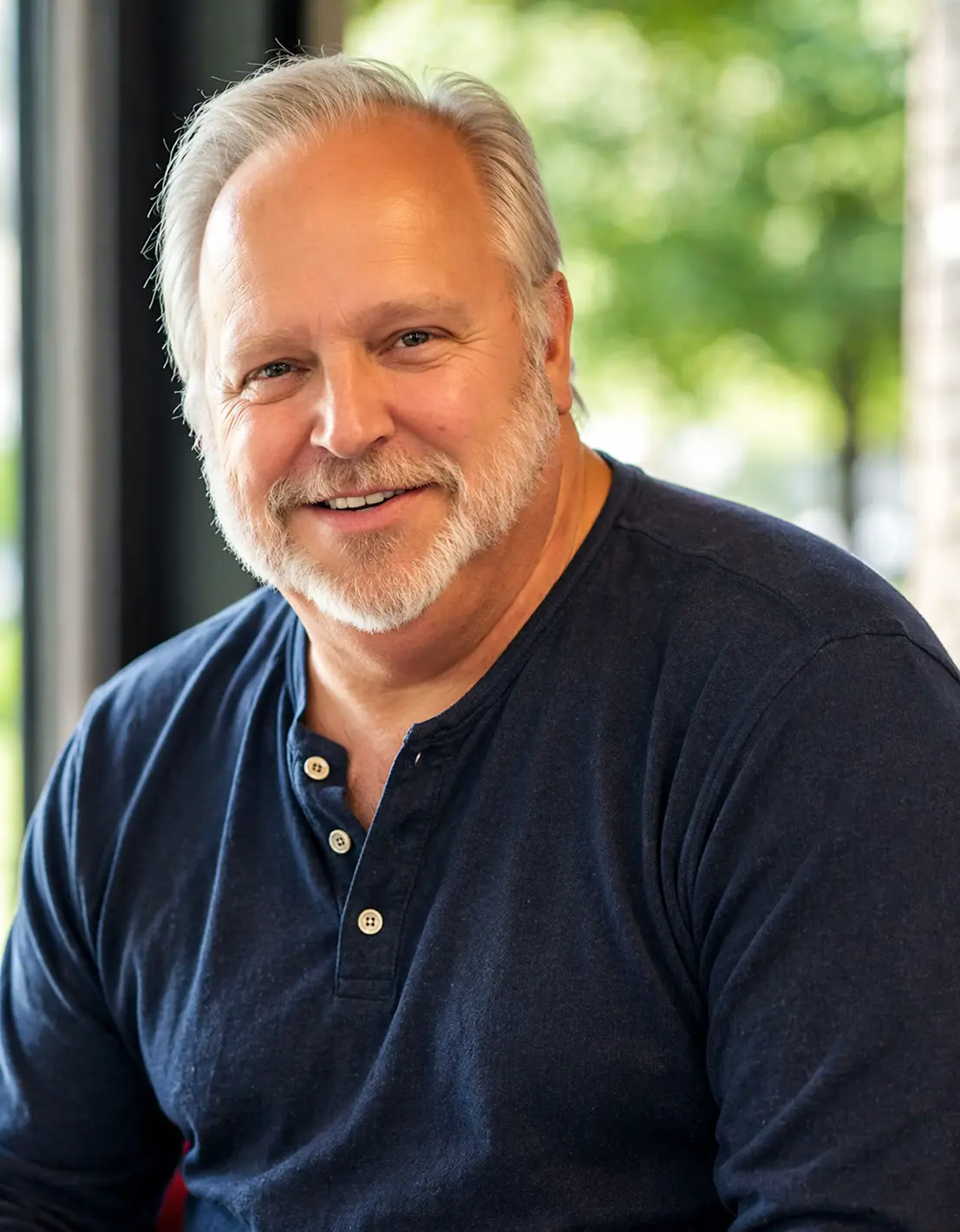 Senior man smiling after getting life insurance coverage easily online with TrustedLifeRates